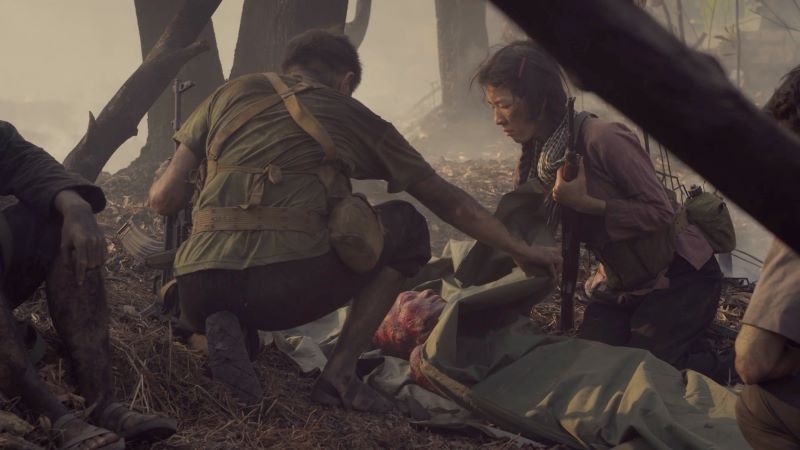 The scene depicts the losses suffered at the Cu Chi Tunnels.